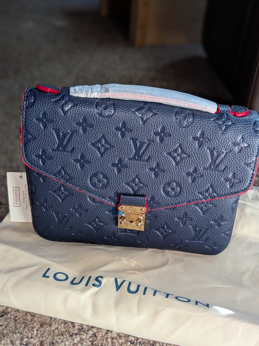 Fashion Inspired Navy Monogram Empreinte Shoulder Bag with Red Trim